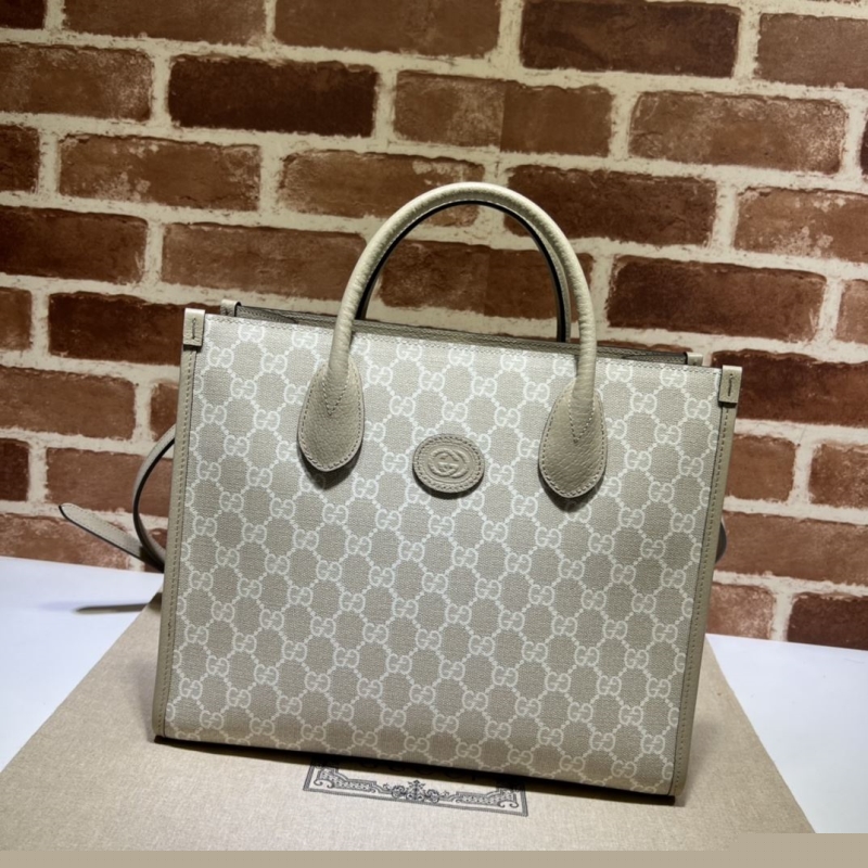 G*u*i shopping bags